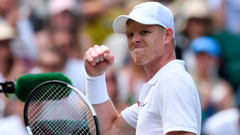 Britain's Kyle Edmund (L) celebrates winning the first set against Spain's Fernando Verdasco during their men's singles second round match on the third day of the 2019 Wimbledon Championships at The All England Lawn Tennis Club in Wimbledon, southwest London, on July 3, 2019