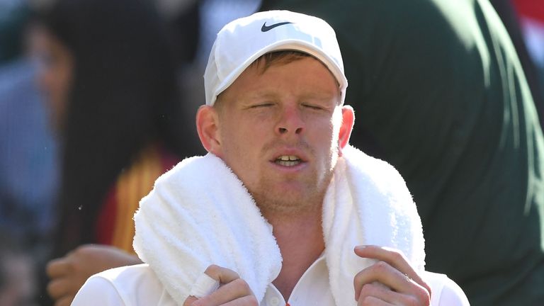 Kyle Edmund reacts as he sits in the break between games against Spain's Fernando Verdasco during their men's singles second round match on the third day of the 2019 Wimbledon Championships at The All England Lawn Tennis Club in Wimbledon, southwest London, on July 3, 2019.