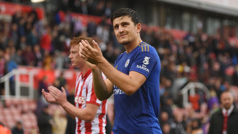 Harry Maguire applauds Leicester fans after a friendly against Stoke