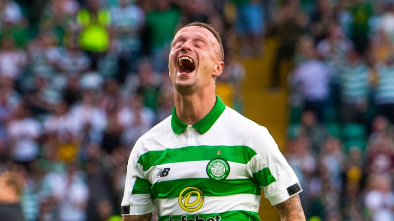 Celtic's Leigh Griffiths celebrates after scoring to make it 3-0