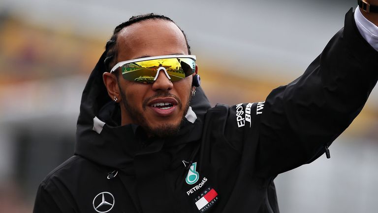 Lewis Hamilton of Great Britain and Mercedes GP waves to the crowd on the drivers parade before the F1 Grand Prix of Great Britain at Silverstone on July 14, 2019 in Northampton, England. 