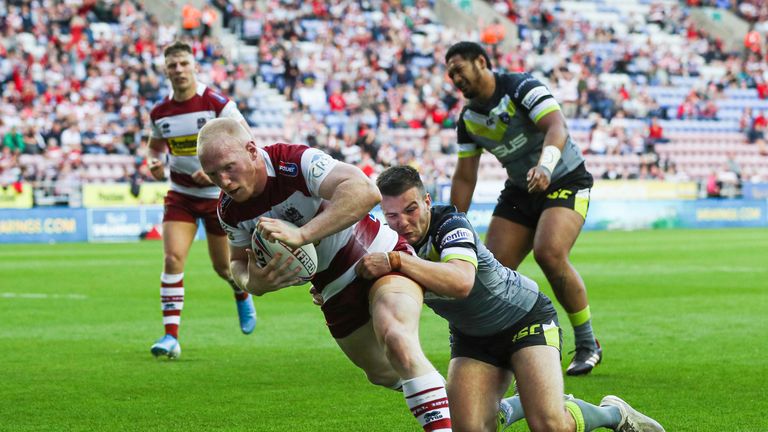 Picture by Paul Currie/SWpix.com - 18/07/2019 - Rugby League - Betfred Super League - Wigan Warriors v Wakefield Trinity - DW Stadium, Wigan, England - Liam Farrell of Wigan Warriors scores the 4th try