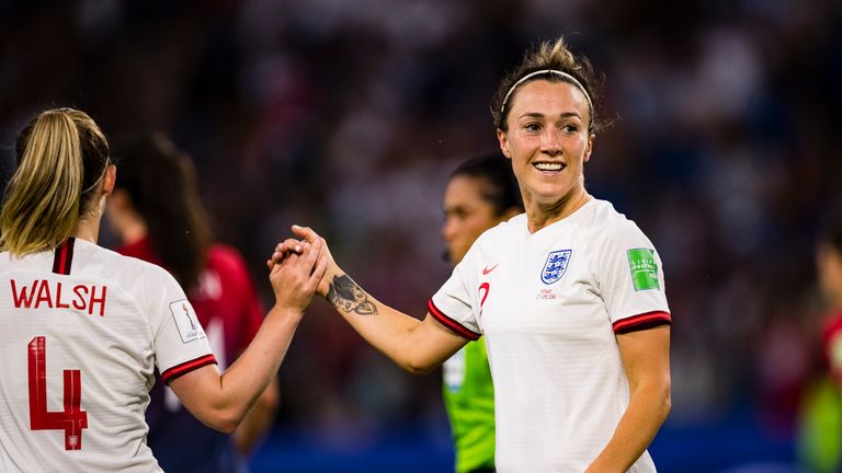 Lucy Bronze celebrates a goal for England Women against Norway