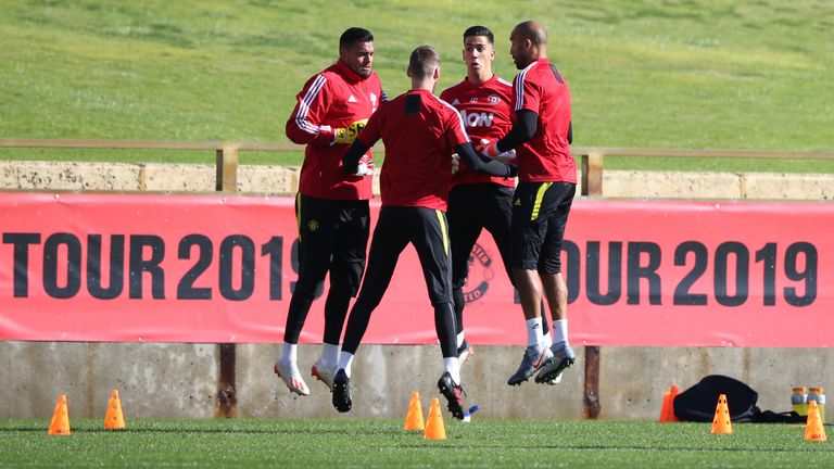 Manchester United's goalkeepers jump into action during pre-season training 