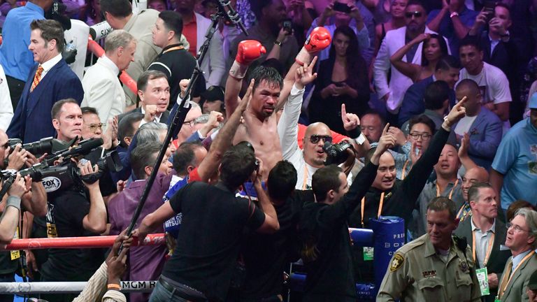 LAS VEGAS, NEVADA - JULY 20. .Manny Pacquiao waves to his fans after going 12 rounds with Keith Thurman during their fight for the WBA welterweight title fight at MGM Grand Garden Arena on July 20, 2019 in Las Vegas, Nevada. Pacquiao took the win by a split decision.  (Photo by Gene Blevins/Getty Images)........