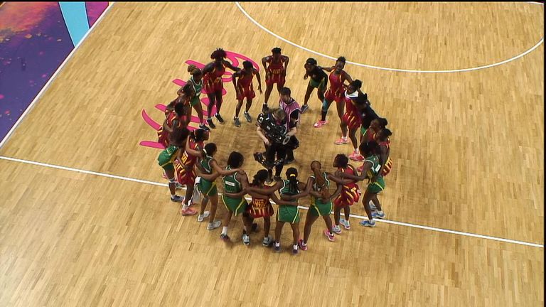 Uganda and Zimbabwe dance after their Netball World Cup game