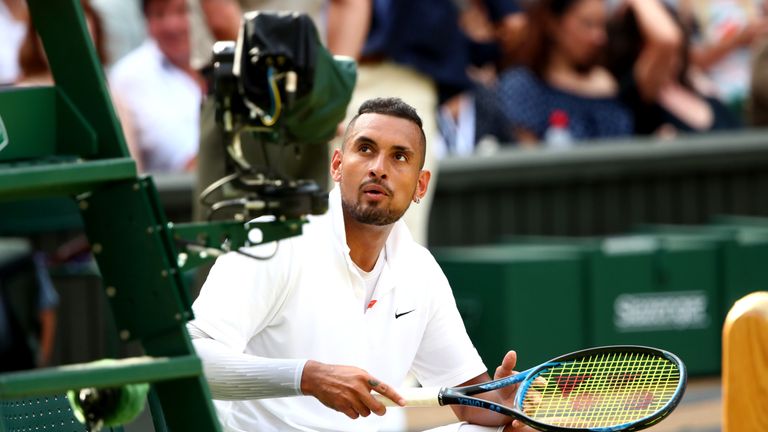 Nick Kyrgios of Australia speaks to the umpire during a change of ends in his Men's Singles second round match against Rafael Nadal of Spain during Day four of The Championships - Wimbledon 2019 at All England Lawn Tennis and Croquet Club on July 04, 2019 in London, England.