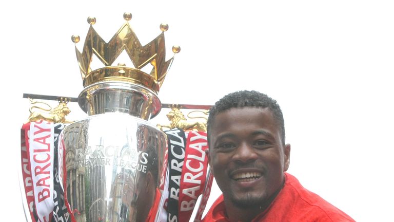 Patrice Evra with the Premier League trophy on May 30, 2011 in Manchester, England.