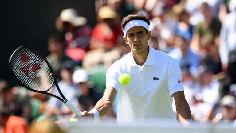 Pierre-Hugues Herbert of France runs to play a forehand during the Men's Singles first round match against Kevin Anderson of South Africa during Day one of The Championships - Wimbledon 2019 at All England Lawn Tennis and Croquet Club on July 01, 2019 in London, England