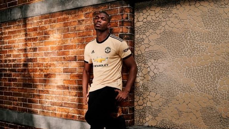 Paul Pogba models the new Man Utd kit despite wanting a “new challenge”