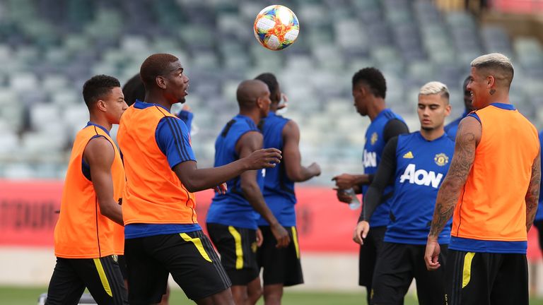 Paul Pogba keeps eyes on the ball during Manchester United training