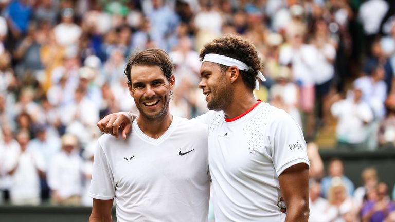 Rafael Nadal (L) of Spain greets Jo-Wilfred Tsonga of France after their Men's Singles third round match during Day six of The Championships - Wimbledon 2019 at All England Lawn Tennis and Croquet Club on July 06, 2019 in London, England