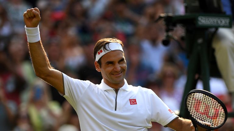 Roger Federer of Switzerland celebrates victory in his Men's Singles Quarter Final match against Kei Nishikori of Japan during Day Nine of The Championships - Wimbledon 2019 at All England Lawn Tennis and Croquet Club on July 10, 2019 in London, England