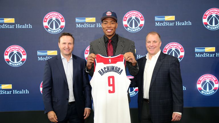  Washington Wizards 2019 draft pick Rui Hachimura poses for a photo with Scott Brooks and Tommy Sheppard