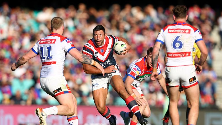 SYDNEY, AUSTRALIA - JULY 20: Ryan Hall of the Roosters runs the ball during the round 18 NRL match between the Sydney Roosters and the Newcastle Knights at Sydney Cricket Ground on July 20, 2019 in Sydney, Australia. (Photo by Jason McCawley/Getty Images)