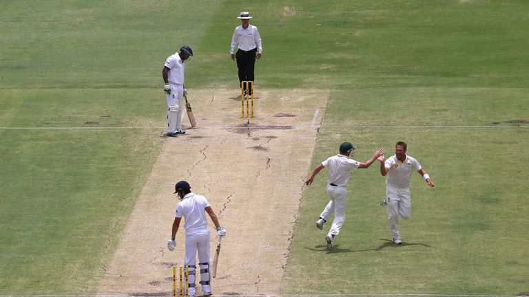 Ryan Harris and Alastair Cook during day four of the Third Ashes Test Match between Australia and England at WACA on December 16, 2013 in Perth, Australia.