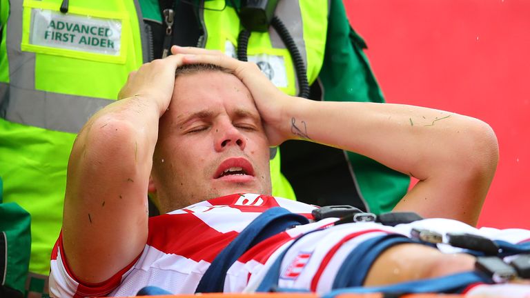 Ryan Shawcross appears in some pain as he is stretchered off during Stoke City's pre-season friendly against Leicester City.