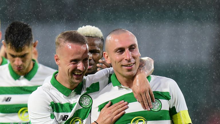 Scott Brown and Leigh Griffiths celebrate Celtic's win at full-time