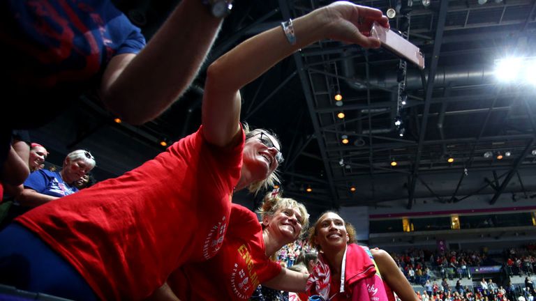 Serena Guthrie celebrating with the fans after wining bronze at a home Netball World Cup