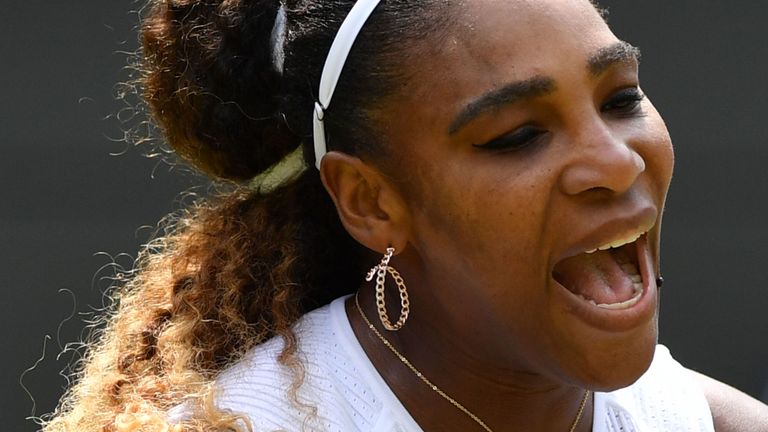 Serena Williams reacts after a point against Spain's Carla Suarez Navarro during their women's singles fourth round match on the seventh day of the 2019 Wimbledon Championships at The All England Lawn Tennis Club in Wimbledon, southwest London, on July 8, 2019