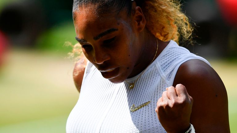 Serena Williams celebrates winning a point against Czech Republic's Barbora Strycova during their women's singles semi-final match on day ten of the 2019 Wimbledon Championships at The All England Lawn Tennis Club in Wimbledon, southwest London, on July 11, 2019. 
