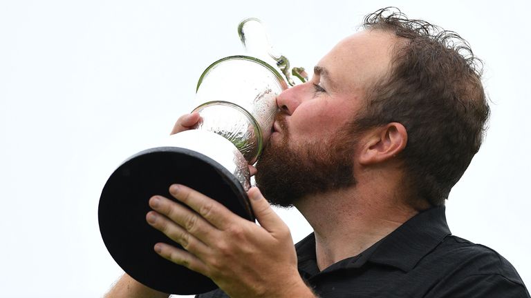Ireland's Shane Lowry kisses the Claret Jug, the trophy for the Champion golfer of the year after winning the British Open golf Championships at Royal Portrush golf club in Northern Ireland on July 21, 2019. 