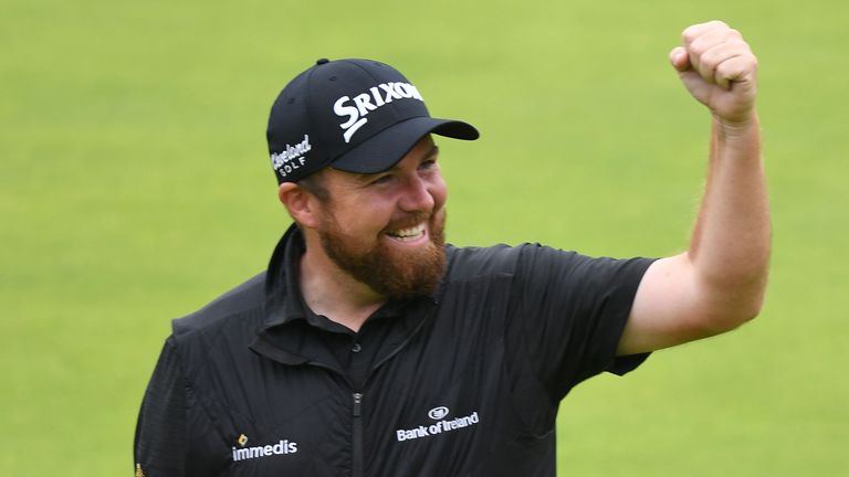 Ireland&#39;s Shane Lowry celebrates as he walks up the 18th fairway during the final round of the British Open golf Championships at Royal Portrush golf club in Northern Ireland on July 21, 2019. 