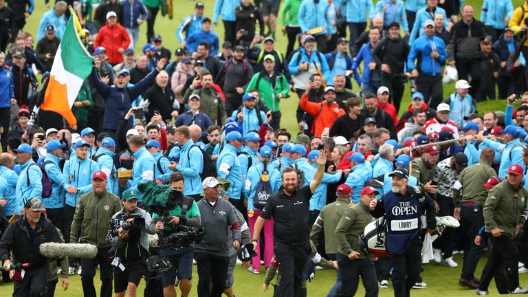 Shane Lowry is cheered home on the 18th at Royal Portrush