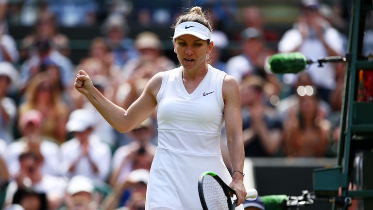 Simona Halep opened play on Court One, which now has a roof