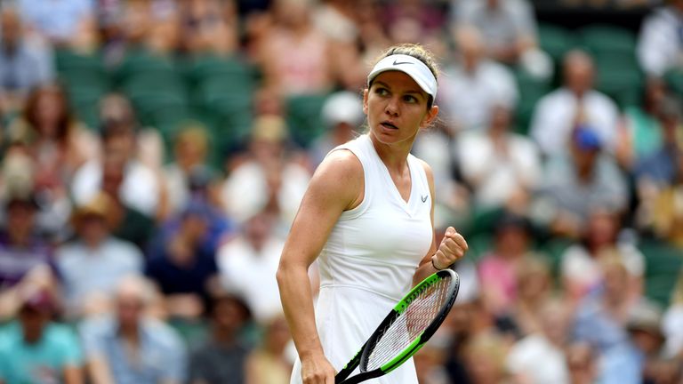 Simona Halep celebrates during her victory against Victoria Azarenka