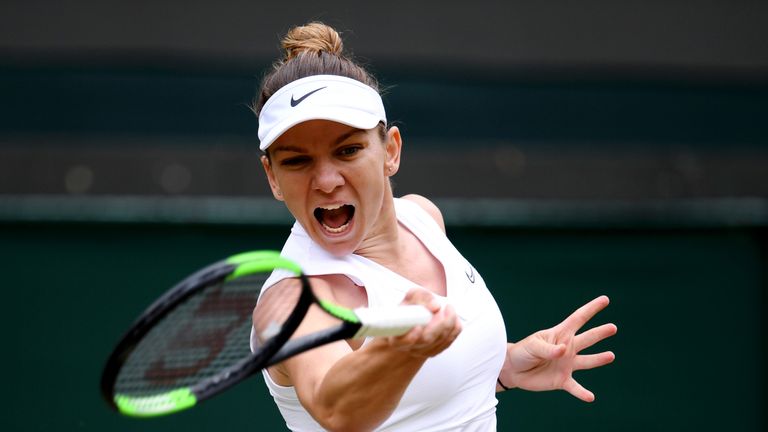 Simona Halep of Romania plays a forehand in her Ladies' Singles Quarter Final match against Shuai Zhang of China during Day Eight of The Championships - Wimbledon 2019 at All England Lawn Tennis and Croquet Club on July 09, 2019 in London, England.