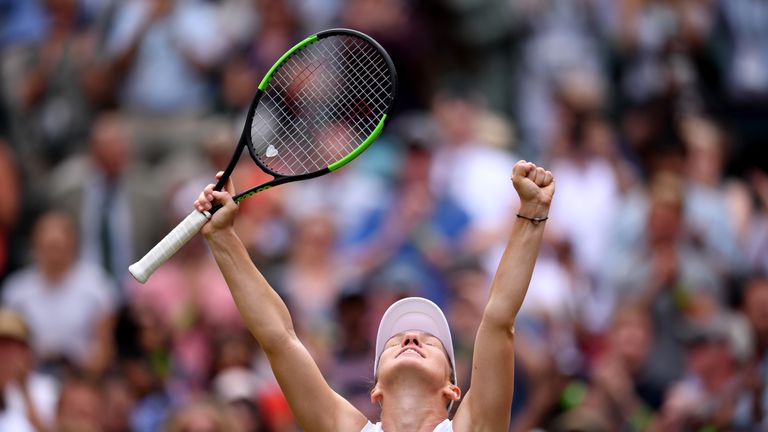 Simona Halep of Romania celebrates victory in her Ladies' Singles Quarter Final match against Shuai Zhang of China during Day Eight of The Championships - Wimbledon 2019 at All England Lawn Tennis and Croquet Club on July 09, 2019 in London, England