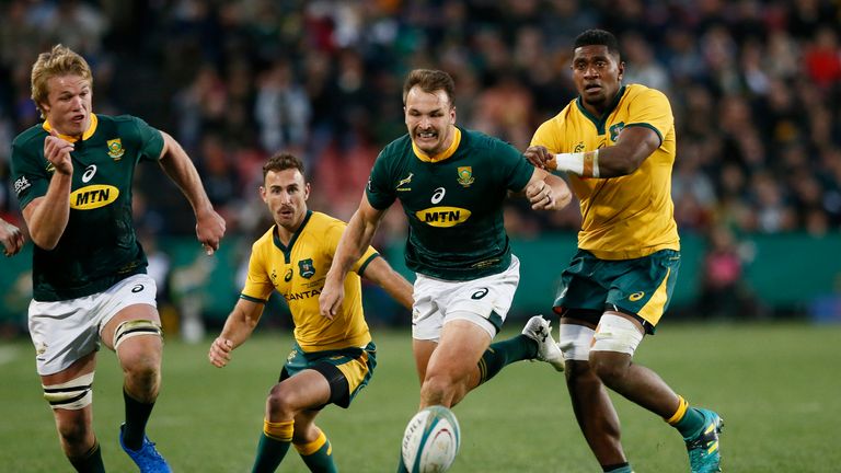 South Africa's Pieter-Steph du Toit (L) and teammate Andre Esterhuizen (R) run for the ball during the 2019 Rugby Championship match South Africa v Australia, at the Emirates Airline Park in Johannesburg, on July 20, 2019. (Photo by PHILL MAGAKOE / AFP) (Photo credit should read PHILL MAGAKOE/AFP/Getty Images)