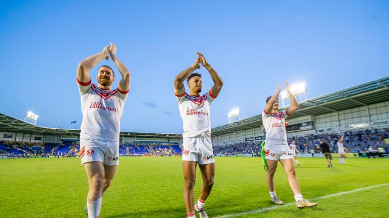 Picture by Allan McKenzie/SWpix.com - 28/06/2019 - Rugby League - Betfred Super League - Warrington Wolves v St Helens - Halliwell Jones Stadium, Warrington, England - St Helens's Kyle Amor, Regan Grace & James Bentley thank the fans after their sides victory over Warrington.