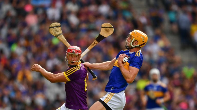 Lee Chin of Wexford in action against Barry Heffernan of Tipperary