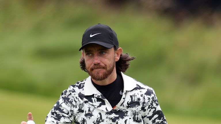 England's Tommy Fleetwood celebrates his putt on the 13th during day four of The Open Championship 2019 at Royal Portrush Golf Club. 