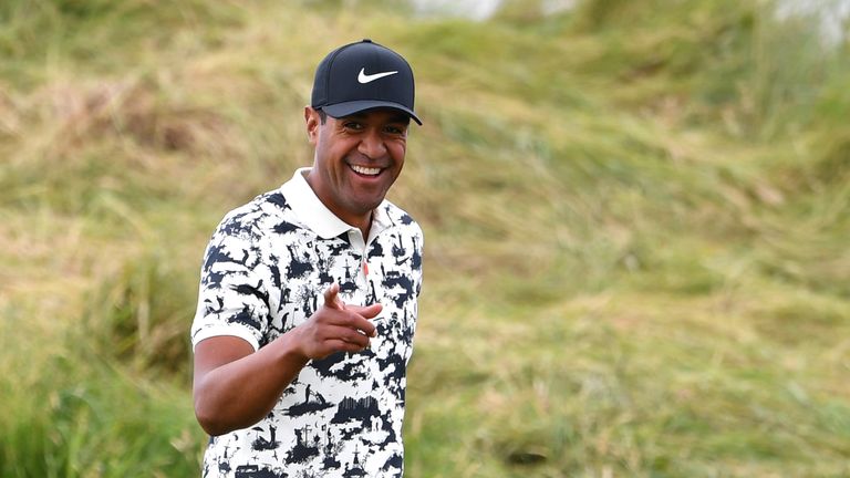 US golfer Tony Finau smiles at spectators on the 1st hole during the third round of the British Open golf Championships at Royal Portrush golf club in Northern Ireland on July 20, 2019. (Photo by Paul ELLIS / AFP) / RESTRICTED TO EDITORIAL USE (Photo credit should read PAUL ELLIS/AFP/Getty Images)