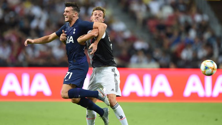Tottenham Hotspur's Troy Parrott (L) fights for the ball with Juventus' Daniele Rugani during the International Champions Cup football match between Juventus and Tottenham Hotspur in Singapore on July 21, 2019. (Photo by Roslan RAHMAN / AFP) (Photo credit should read ROSLAN RAHMAN/AFP/Getty Images)
