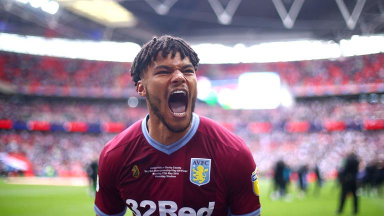 Tyrone Mings celebrates following Aston Villa&#39;s play-off final win over Derby