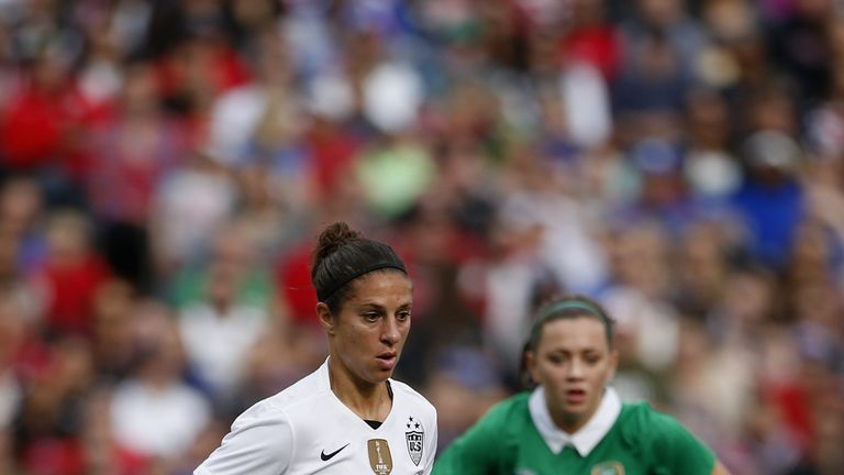 Republic of Ireland midfielder Katie McCabe (R) in action against the USA  