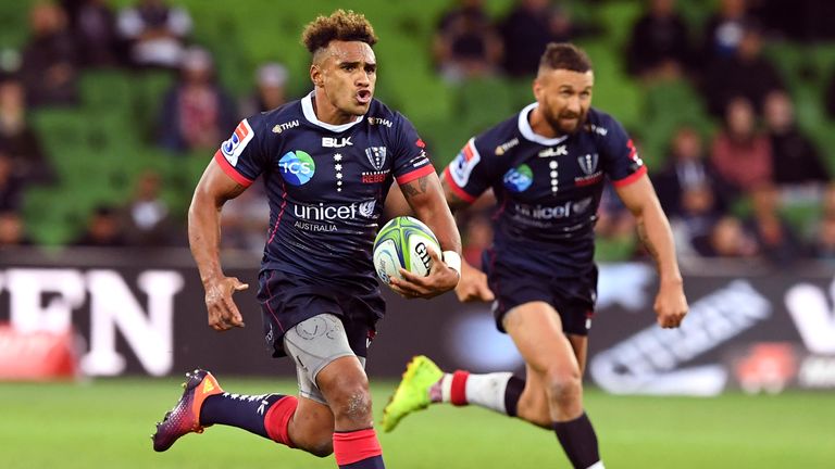 Will Genia (L) and Quade Cooper (R) in action for the Rebels