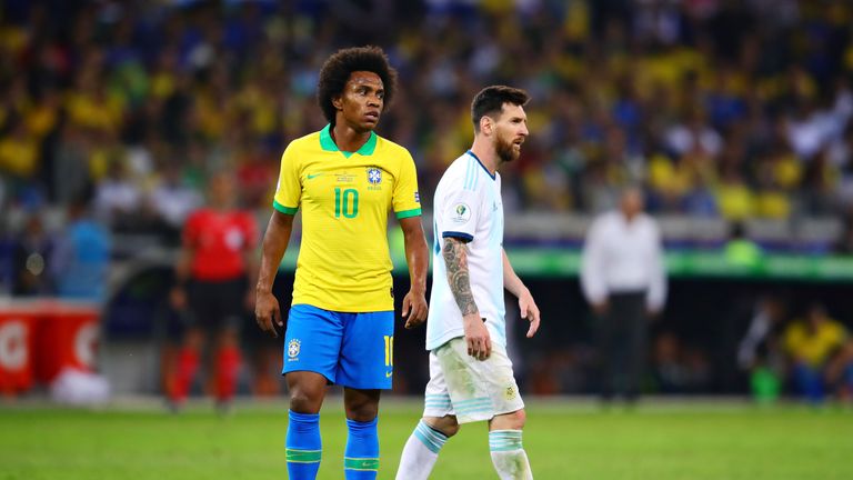 Willian of Brazil and Lionel Messi of Argentina pictured in the Copa America semi-final