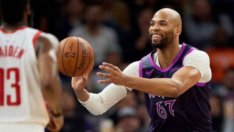 Taj Gibson throws a pass during a Minnesota Timberwolves game