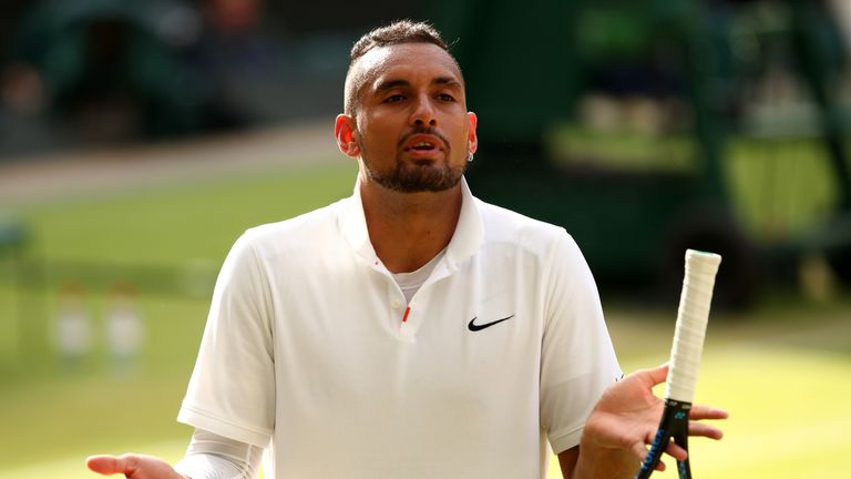 Nick Kyrgios of Australia reacts in his Men's Singles second round match against Rafael Nadal of Spain during Day four of The Championships - Wimbledon 2019 at All England Lawn Tennis and Croquet Club on July 04, 2019 in London, England