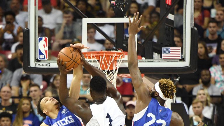 Zion Williamson powers through Kevin Knox and Mitchell Robinson to score at the rim