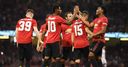 Utd beat Milan on pens to stay perfect