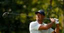 Frustrated Woods crashes to 75