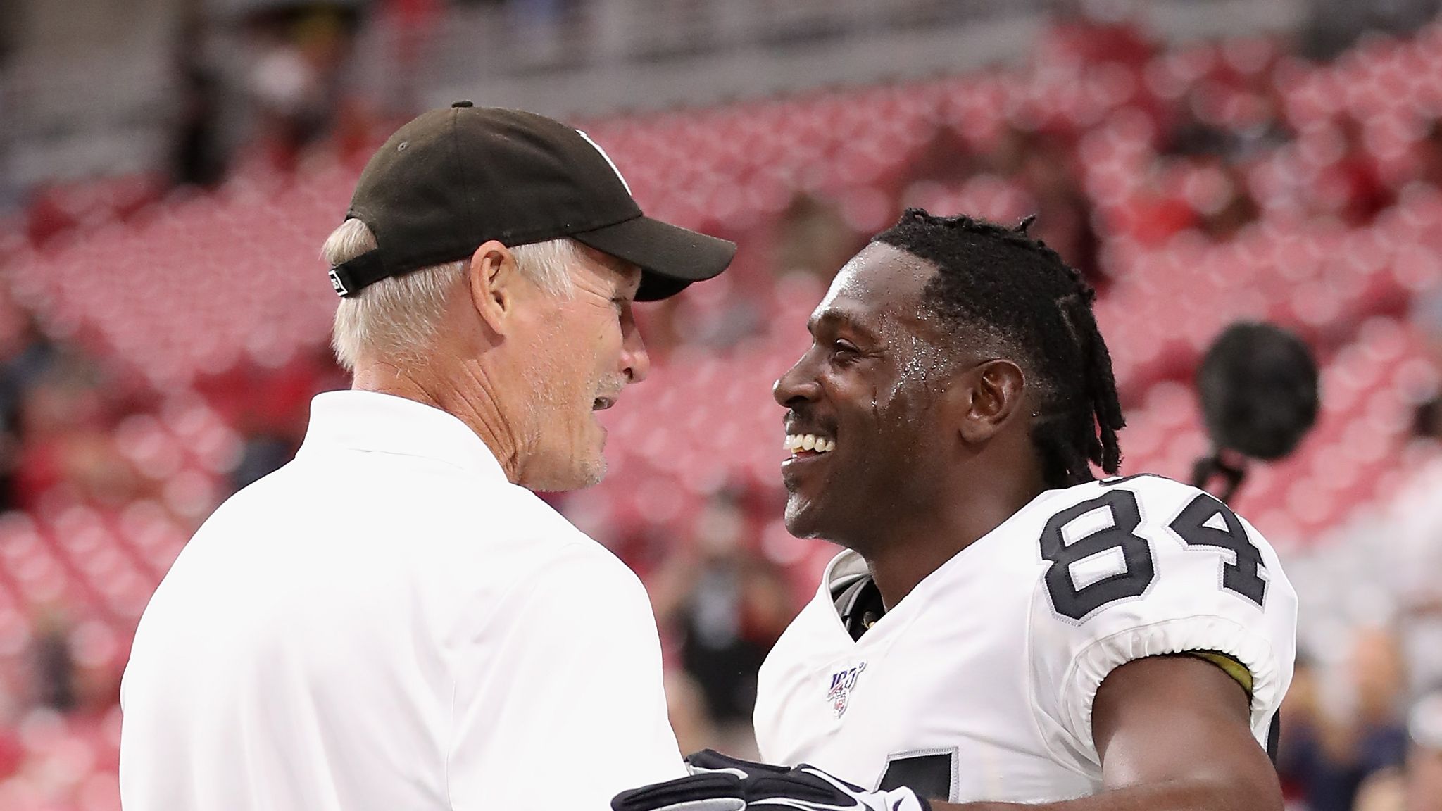 Oakland Raiders receiver Antonio Brown decides on a helmet