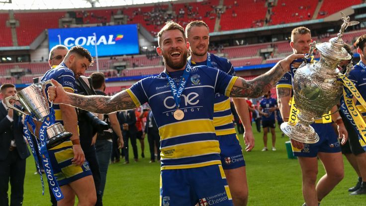 Warrington's Daryl Clark celebrates winning man of the match and the Coral Challenge Cup Final at Wembley Stadium, London. PRESS ASSOCIATION Photo. Picture date: Saturday August 24, 2019. See PA story RUGBYL Final. Photo credit should read: Paul Harding/PA Wire. RESTRICTIONS: Editorial use only. No commercial use. No false commercial association. No video emulation. No manipulation of images.  