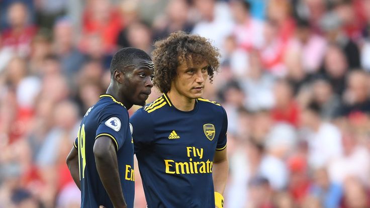 Nicolas Pepe and David Luiz of Arsenal during the defeat to Liverpool at Anfield